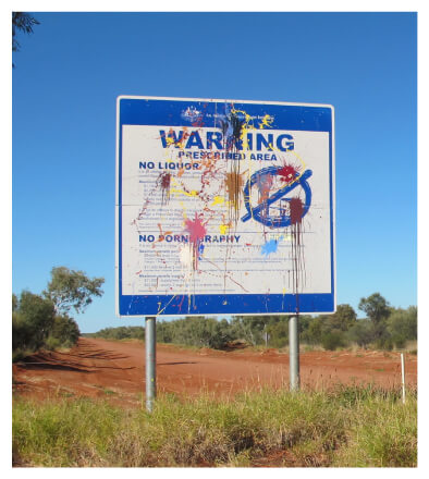 A warning sign of the Northern Territory Emergency Response (NTER) showing ban on alcohol and pornography in Aboriginal Communities